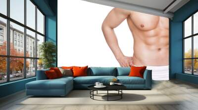 Fit muscular man in towel, isolated on white background Wall mural