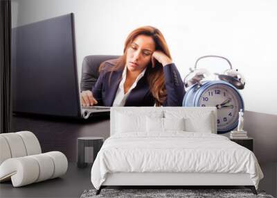 Tired young business woman sleeping next to his laptop computer Wall mural