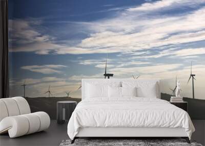 windmills in the top of a montain with blue sky and clouds, alte Wall mural