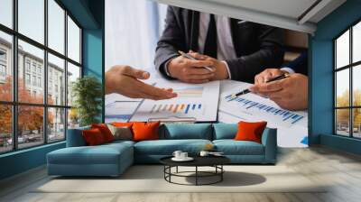 Meeting concept Business team hands at working with financial plan, meeting, discussion, brainstorm with tablet on the office desk Wall mural