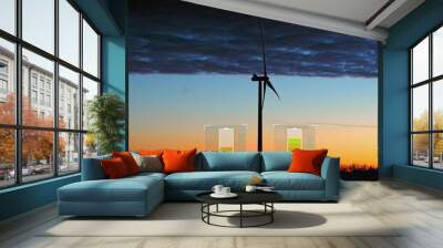 Wind turbine collecting electricity with a vivid sunset sky background. 3D render with battery charging animation Wall mural