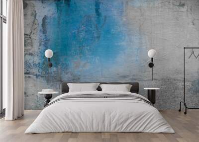 Abstract texture of old colorful wall with grain and scratches. Beautiful, artistic, creative background. White, gray and blue rough weathered stone texture. Copy space Wall mural