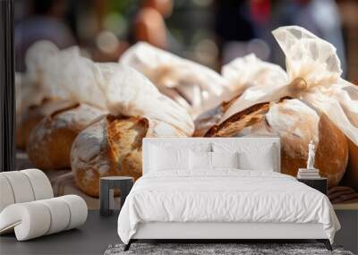 Freshly baked bread in bags at a farmers market  Wall mural