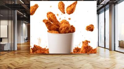 Fried chicken flying out of paper bucket isolated on transparent and white background.PNG image. Wall mural