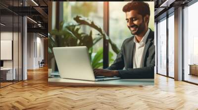 indian business man working on laptop  Wall mural