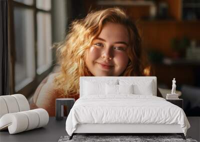 Portrait of Teenager woman chubby smiling and looking to camera while relax in living room at home.  Wall mural