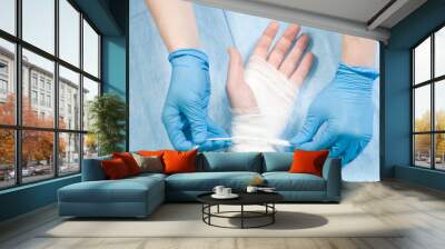 Doctor bandages hands Wall mural