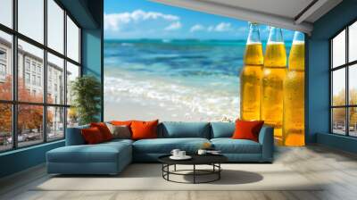 Beer bottles with golden liquid, on the white sand at the beach, with a calm ocean and a blue sky. Wall mural