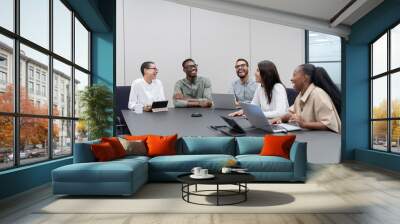 Business people having meeting in office Wall mural