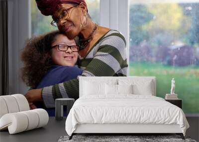 Mother hugging daughter with Down Syndrome Wall mural