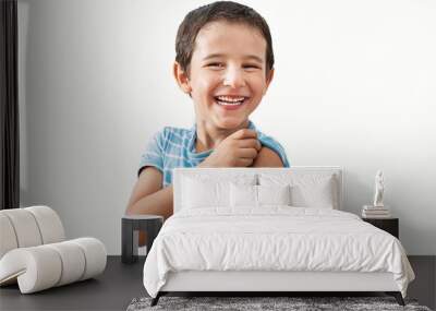 Portrait, happy and kid with plaster in studio isolated on a white background.Face, smile and boy child with bandage after vaccine, injury or wound for healthcare, first aid and excited Wall mural