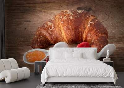 croissant and jam on wooden table Wall mural