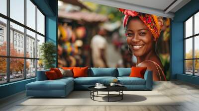 A woman wearing a colorful head scarf is smiling at the camera Wall mural