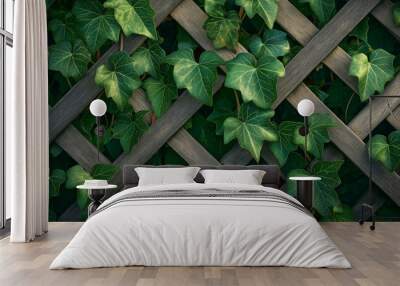 Lush green ivy growing through a wooden lattice, creating a natural, textured background. Wall mural