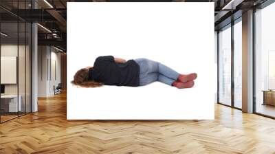 back view of a young girl lying on the floor on white background Wall mural