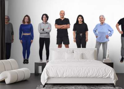 front view of a  group of women and men wearing sportswear on white background Wall mural