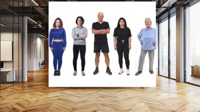 front view of a  group of women and men wearing sportswear on white background Wall mural