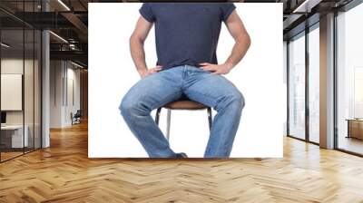 man sitting on a chair look side on white Wall mural