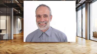 portrait of a middle-aged man with shirt and white background Wall mural