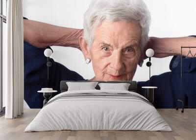 portrait of a senior woman on white background Wall mural