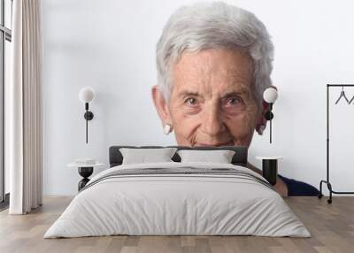 portrait of a senior woman on white background Wall mural