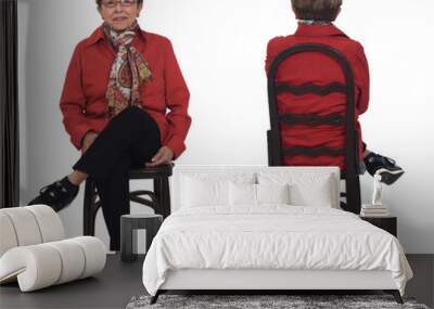 view of front and back on senior woman sitting on chair on whte background Wall mural