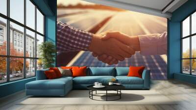 Firm representatives engage in a handshake before an expanse of solar panels, signifying alliances fostered for green initiatives. Corporate carbon reduction Wall mural