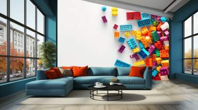  A pile of colorful Lego blocks scattered all over the place isolated in white background Wall mural