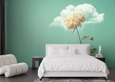 A flower is shown with rain falling on it Wall mural