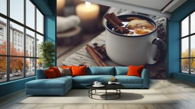 A mug of hot chocolate with cinnamon and apple slices on a wooden table Wall mural