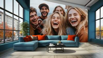 Group of friends laughing and having fun outdoors together, A joyful image that is popular in lifestyle, travel and entertainment. Wall mural