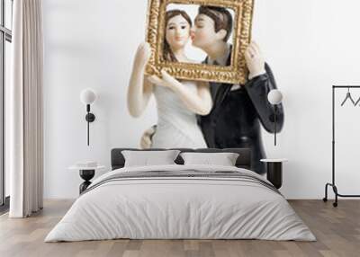 Couple wedding cake topper isolated Wall mural