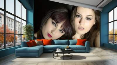 Two beautiful young sensual glamour women standing together over Wall mural