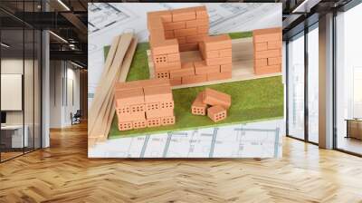 Model house construction with brick on blueprint Wall mural