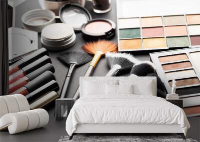 Multiple cosmetic products on black background. High resolution image for cosmetics and fashion industry. Wall mural