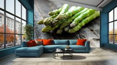  Delicious green asparagus on a wooden background  Wall mural