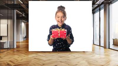 Female child receives a gift surprised and glad. Wall mural