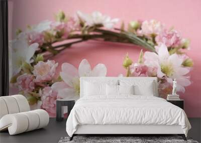 Flower crown on pink background. Spring celebration. Wall mural