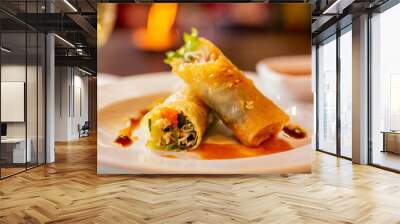 Spring rolls on dish at Asian restaurant Wall mural