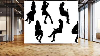 set of silhouettes of woman sitting vector Wall mural