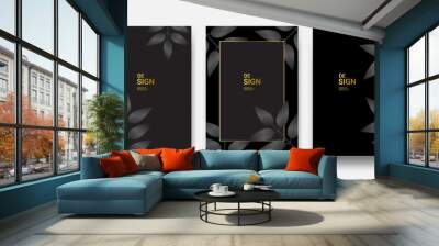 A set of elegant tropical black and gold cover template layouts set on a foliage background, luxury spa, hotel, card, invitation, salon, etc. Wall mural