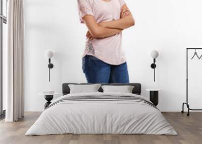 Ready to take on the day. Full length portrait of an attractive young woman standing with her arms folded in a studio isolated on white. Wall mural