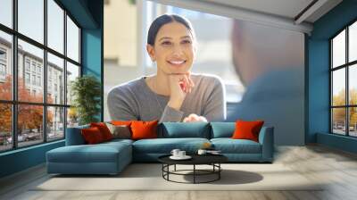 Absorbing all the knowledge she can. an attractive young businesswoman listening attentively to a colleague during a meeting. Wall mural