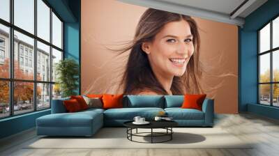 Beauty, hair and face with woman in hair care and facial treatment marketing with keratin and smile against studio background. Makeup, natural cosmetics and mockup, happy model and skincare. Wall mural