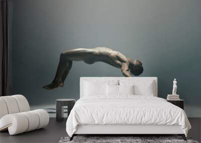 Float, man and naked model in a white background studio for creative art with shadow. Isolated, floating and nude body of a african male in the air with light showing artistic and erotic projection Wall mural