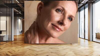 relief from the days cares. studio shot of a mature woman with beautiful skin. Wall mural