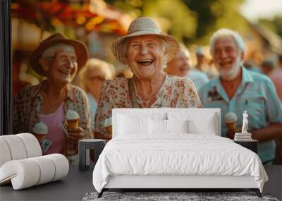  Elderly people are laughing and enjoying ice cream cones at an outdoor festival Wall mural