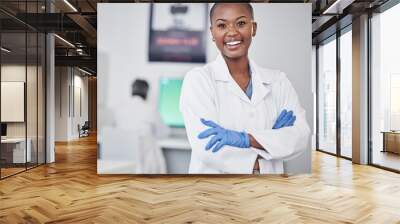 Scientist, black woman and happy in portrait, arms crossed with medical research and science study in laboratory. African female doctor, pathology or biotech, scientific experiment and confidence Wall mural