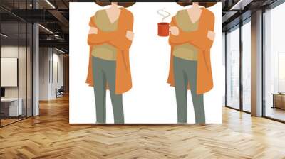 young woman in casual attire standing with arms crossed, holding a mug of hot coffee Wall mural