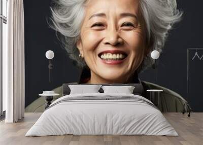 Beautiful portrait of happy old women on blur background Wall mural